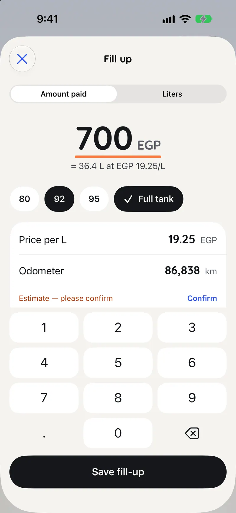 Fill up sheet on iPhone: 700 EGP entered, worked out as 36.4 litres at 19.25 EGP per litre, grade 92 and Full tank selected.